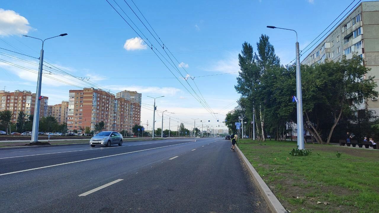 Асфальт с нанесенной разметкой на участке от Крупской до 70 лет Октября
