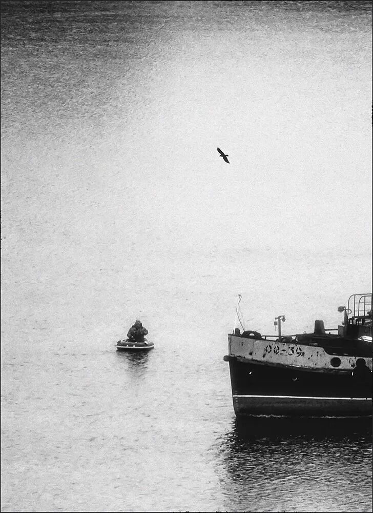 Архивная фотография рыбака на Волге